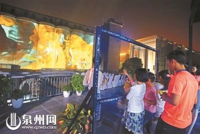 泉州市民与艺术零距离接触 “涂鸦”秀在大罐上-闽南网